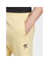 adidas Teplákové kalhoty Trefoil Essentials Joggers IA4831 Žlutá Slim Fit - Pepit.cz