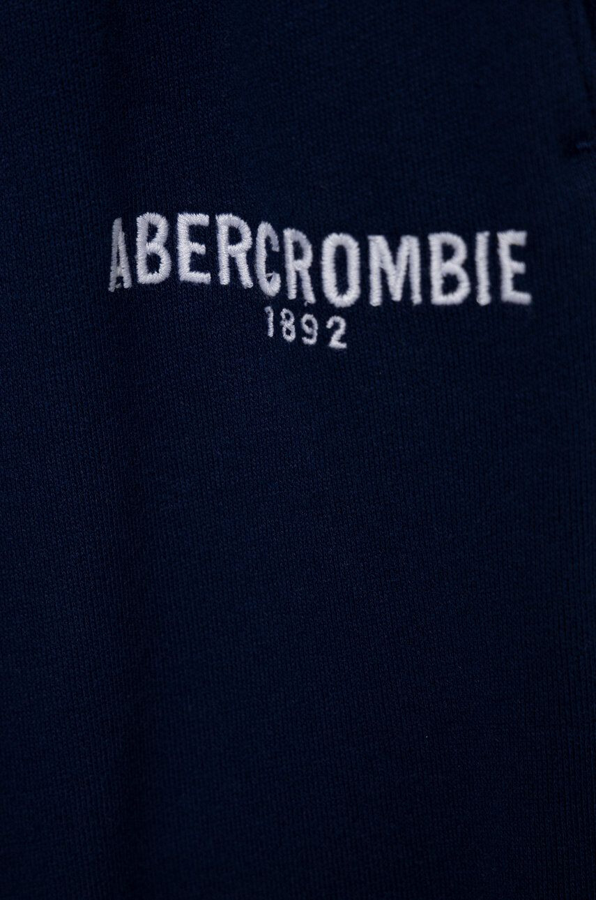 Abercrombie & Fitch Dětské tepláky tmavomodrá barva hladké - Pepit.cz