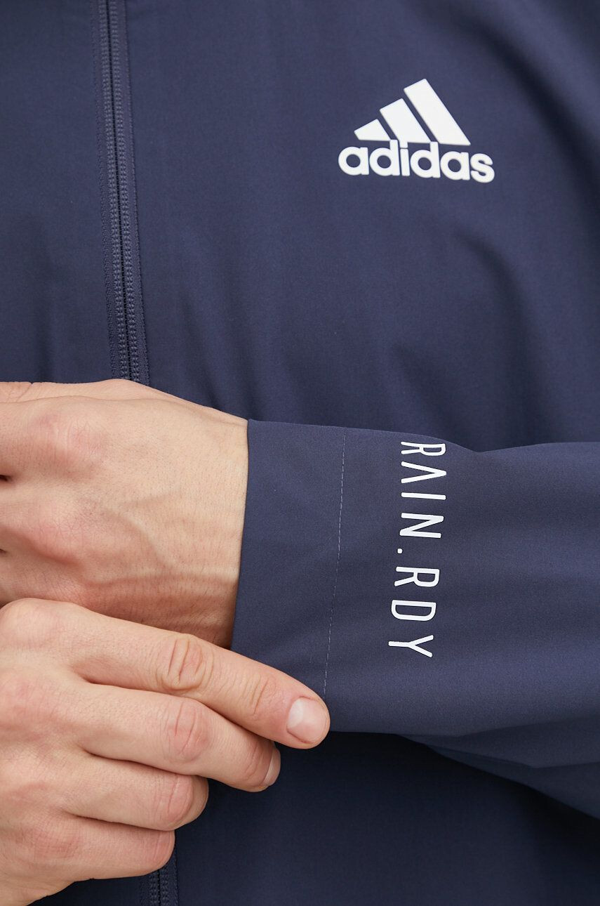 adidas Nepromokavá bunda pánská tmavomodrá barva přechodná - Pepit.cz