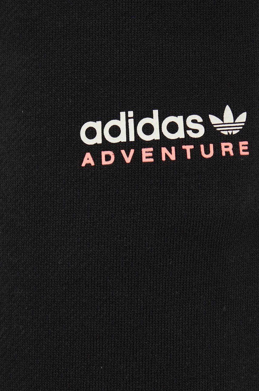 adidas Originals Bavlněné tepláky HF4771 černá barva s potiskem - Pepit.cz