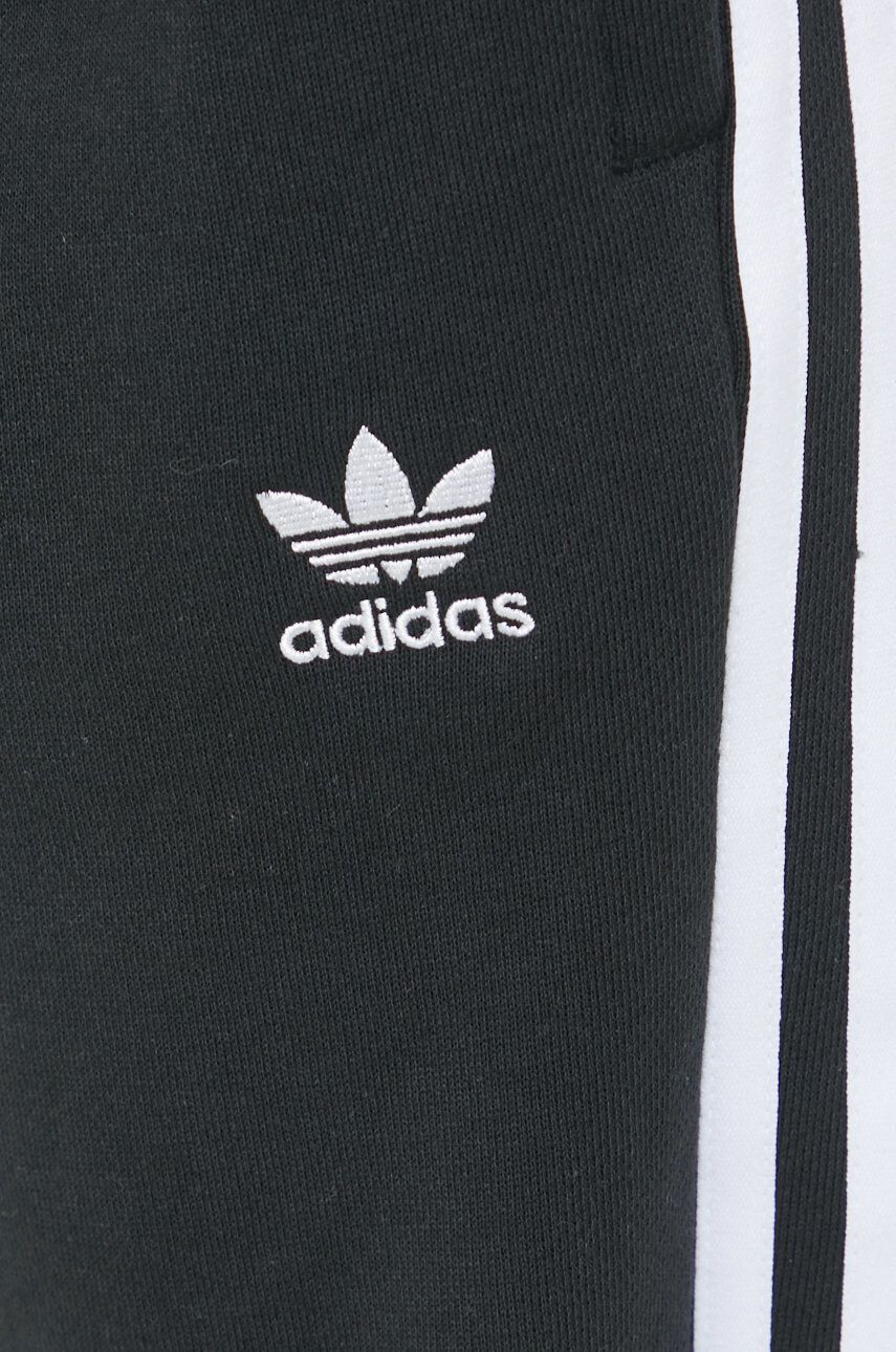 adidas Originals Bavlněné tepláky černá barva s aplikací - Pepit.cz