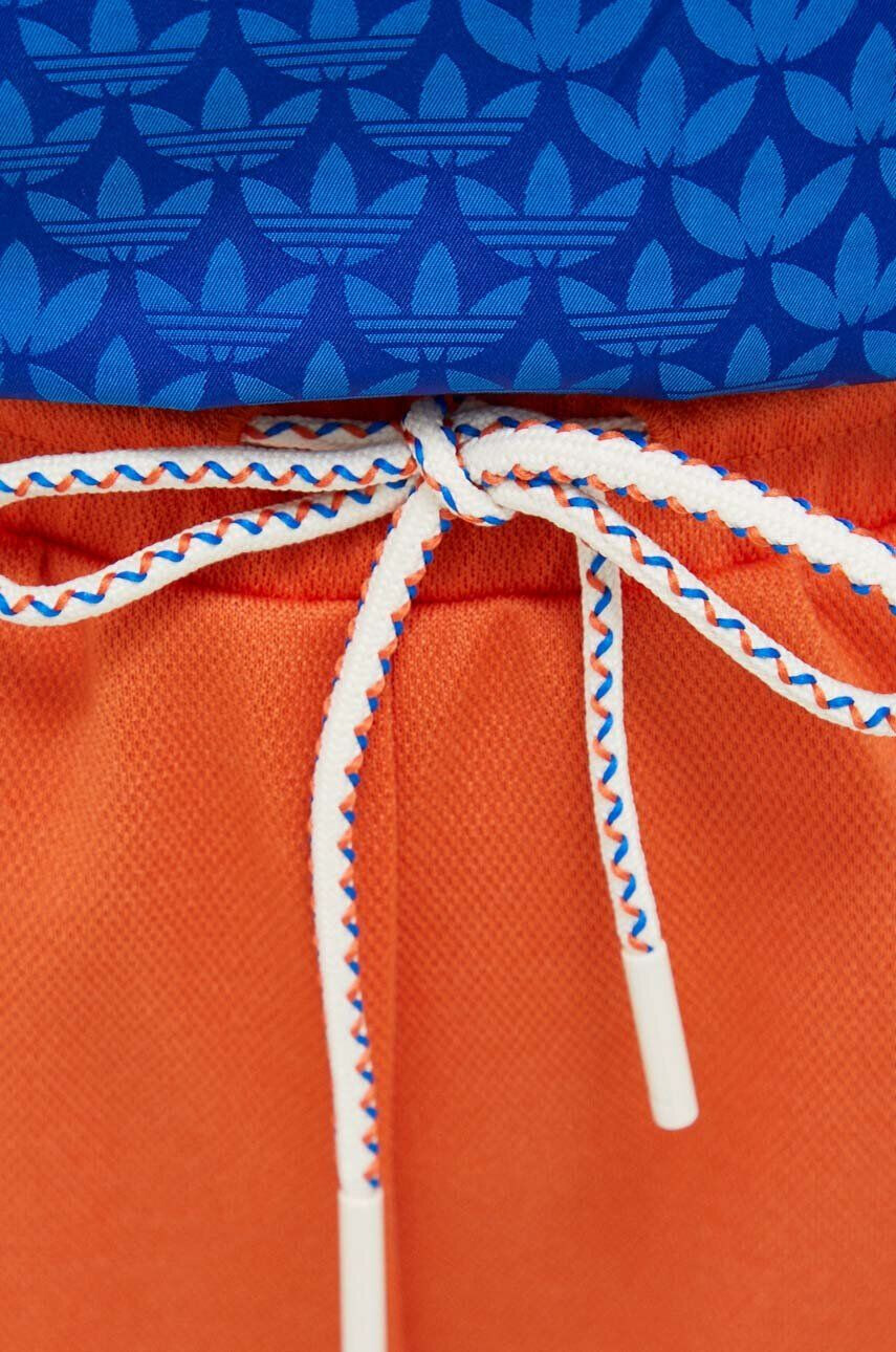 adidas Originals Tepláky oranžová barva vzorované - Pepit.cz