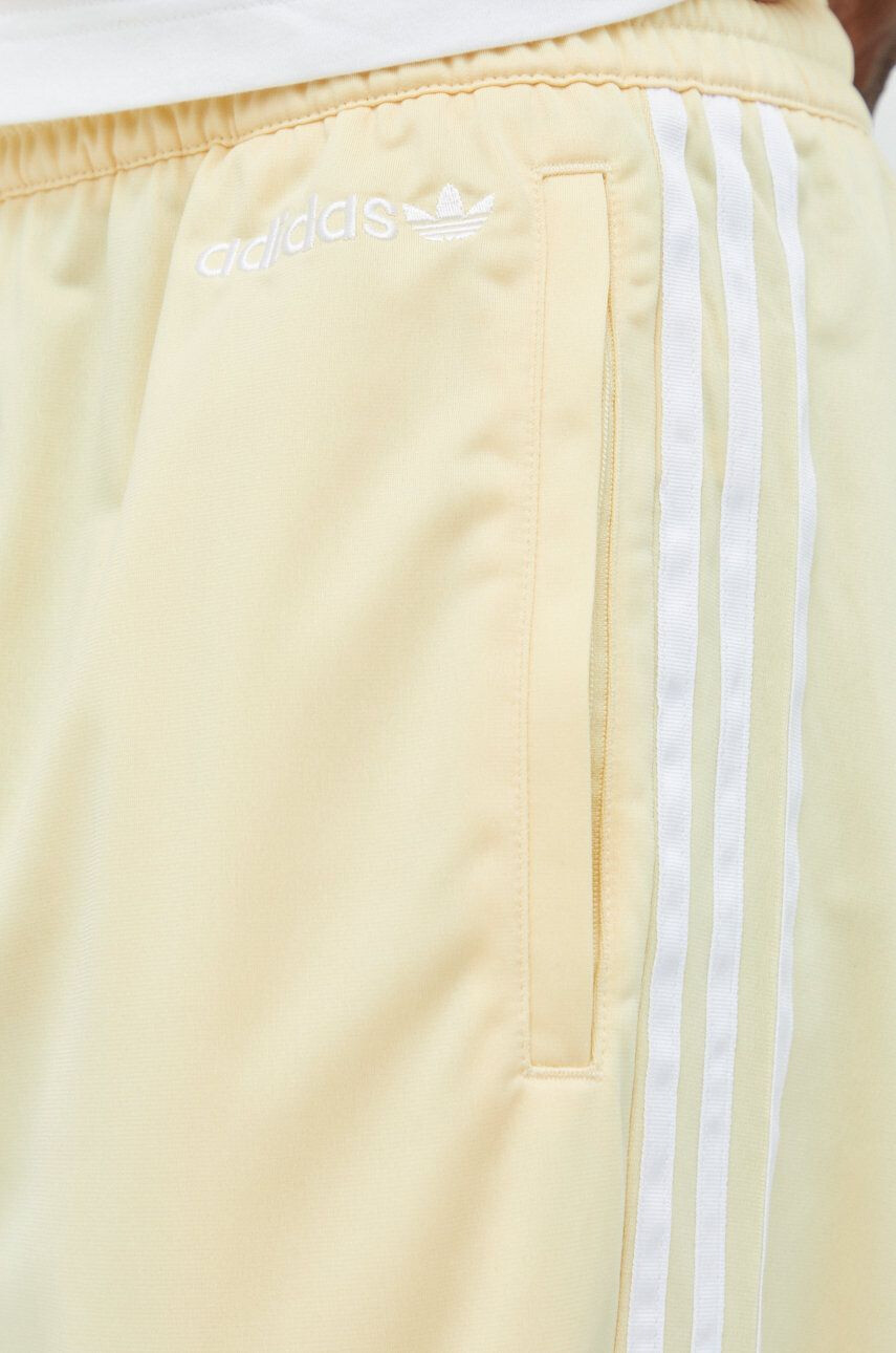 adidas Originals Tepláky pánské žlutá barva hladké - Pepit.cz