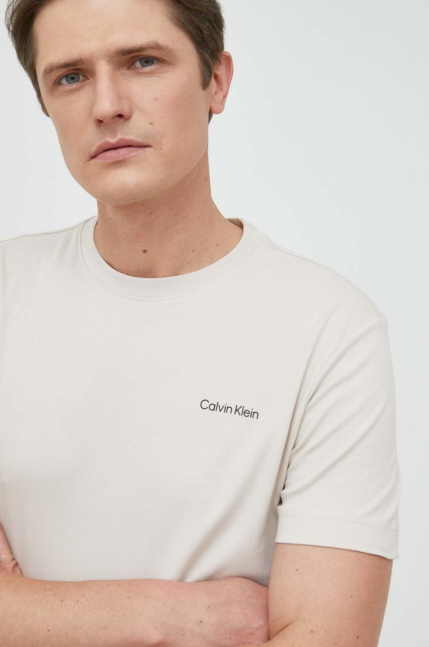 Calvin Klein Bavlněné tričko béžová barva - Pepit.cz