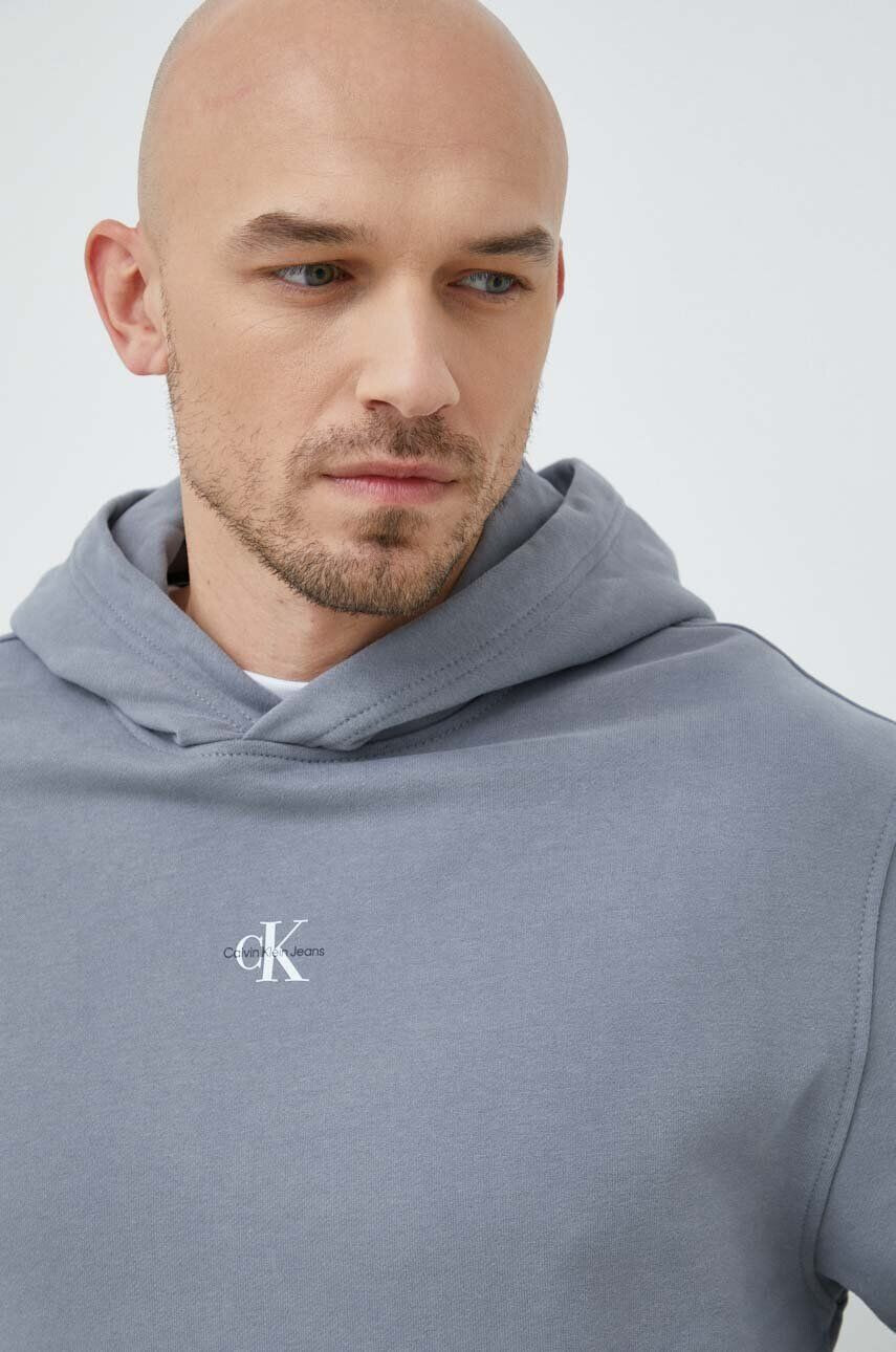 Calvin Klein Jeans Bavlněná mikina pánská šedá barva s kapucí s potiskem - Pepit.cz