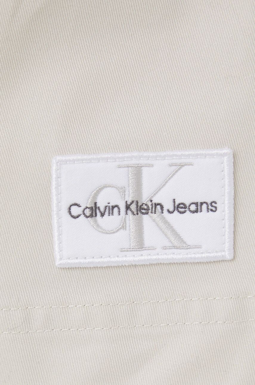 Calvin Klein Jeans Bavlněné šaty béžová barva mini jednoduchý - Pepit.cz