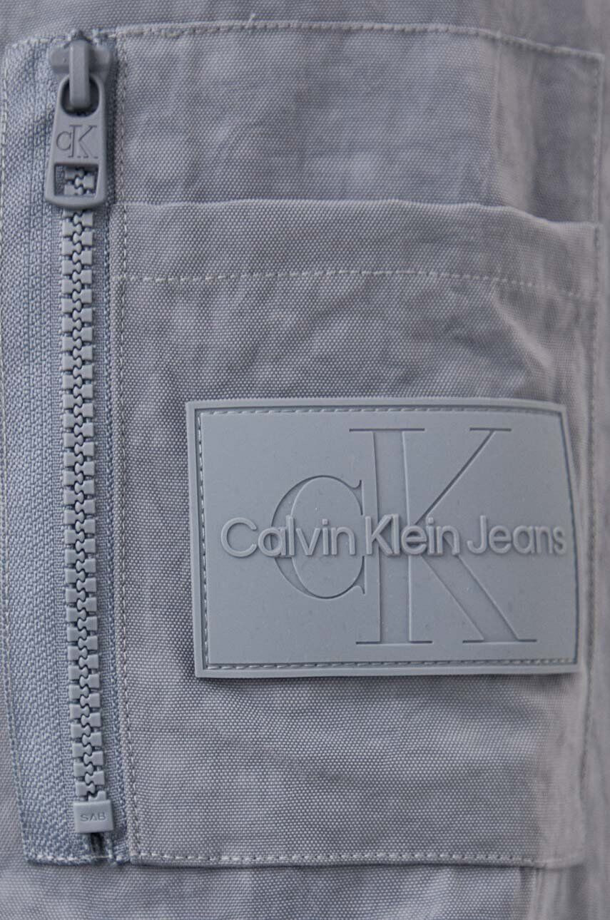 Calvin Klein Jeans Bomber bunda černá barva přechodná oversize - Pepit.cz