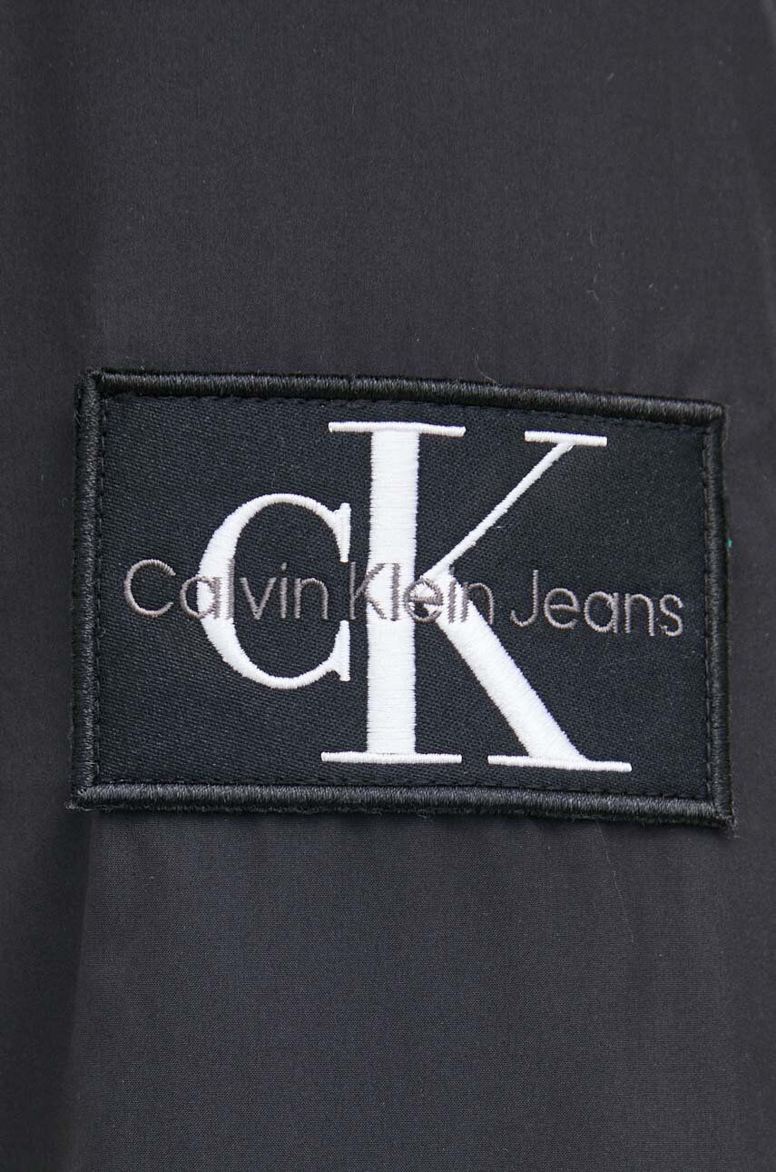 Calvin Klein Jeans Bunda pánská černá barva přechodná - Pepit.cz