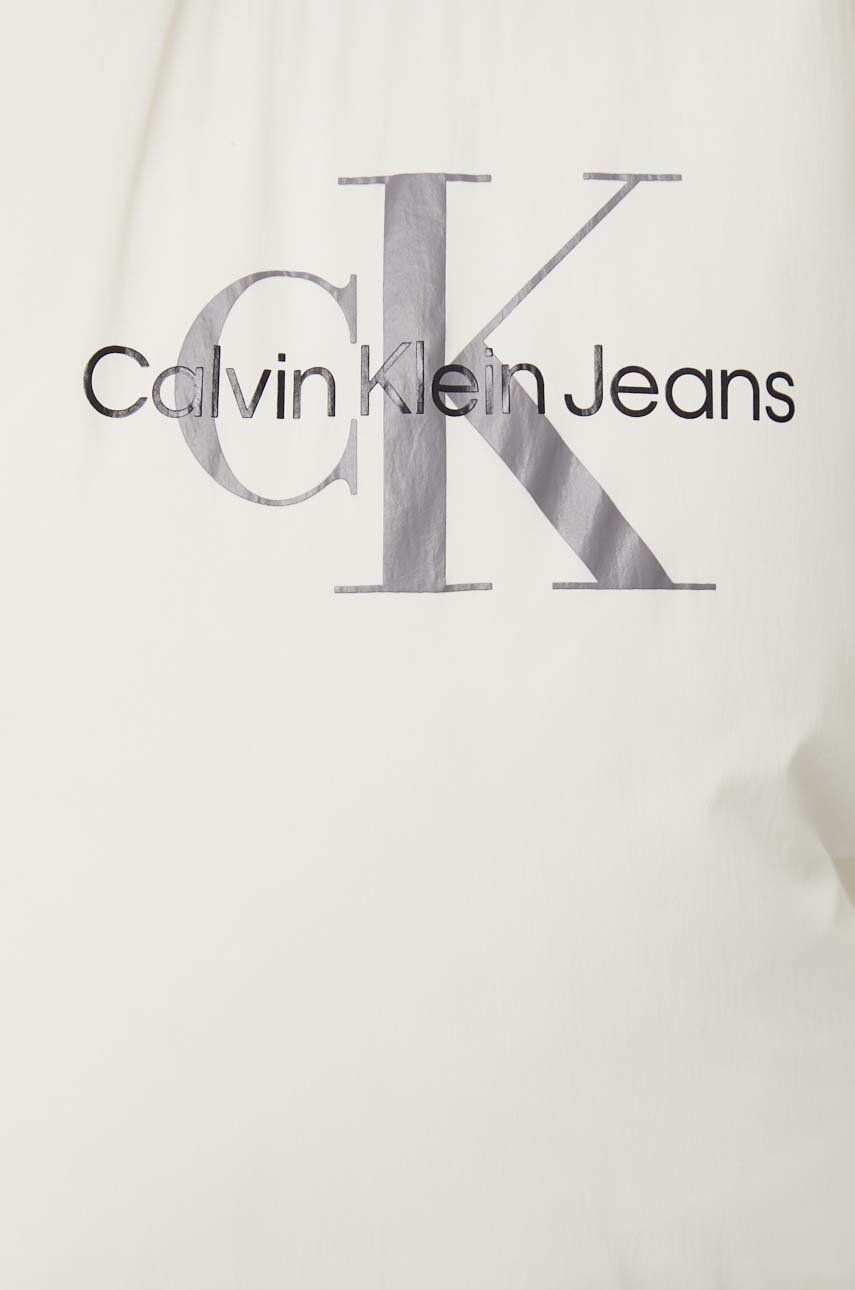 Calvin Klein Jeans Bunda dámská béžová barva zimní oversize - Pepit.cz