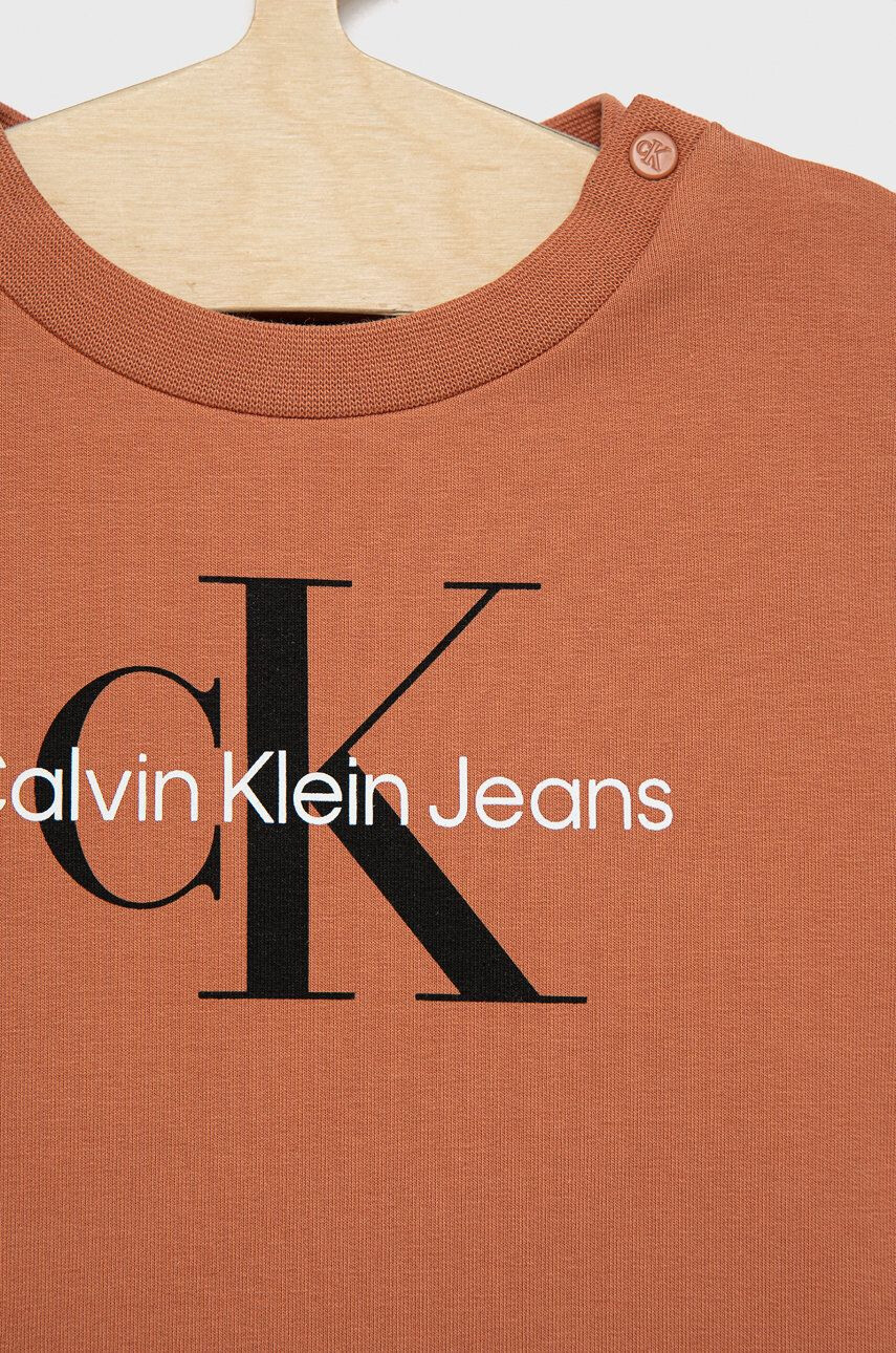 Calvin Klein Jeans Dětská tepláková souprava oranžová barva - Pepit.cz