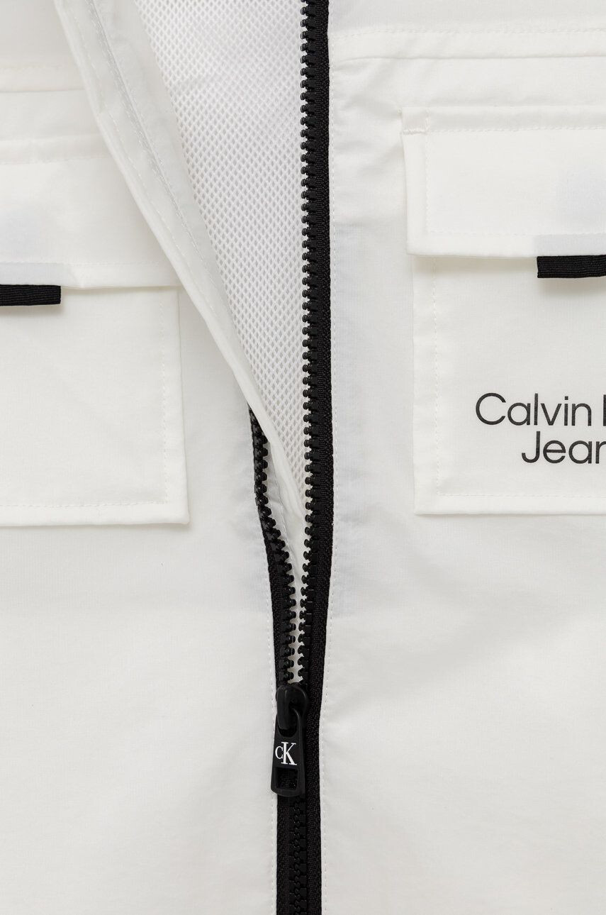 Calvin Klein Jeans Dětská bunda bílá barva - Pepit.cz