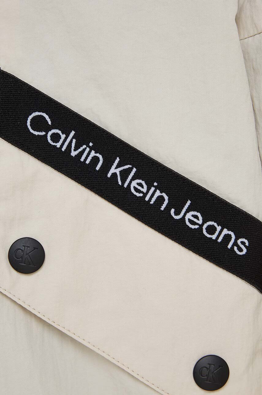 Calvin Klein Jeans Dětská bunda bílá barva - Pepit.cz