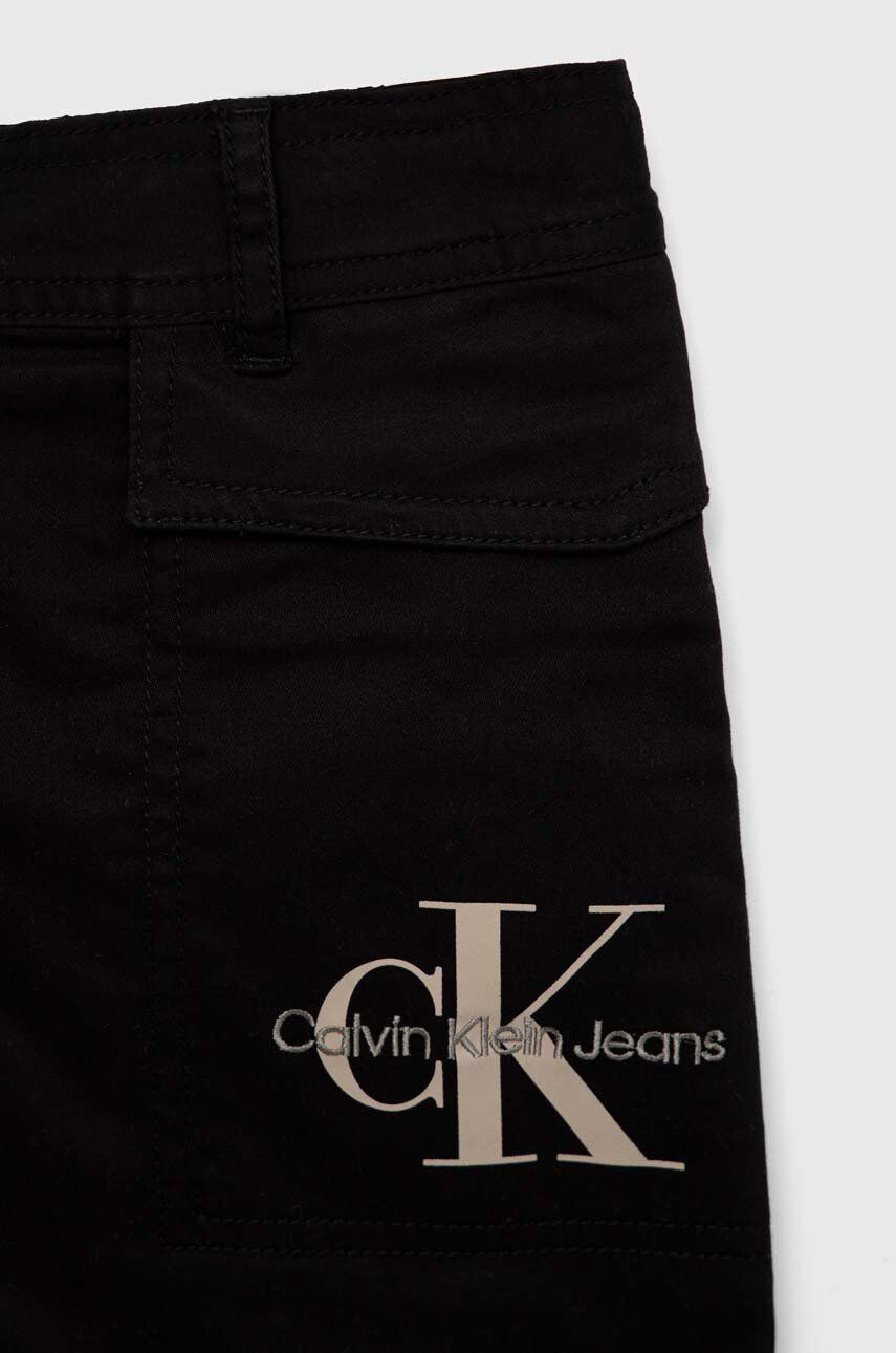 Calvin Klein Jeans Dětská sukně černá barva mini áčková - Pepit.cz