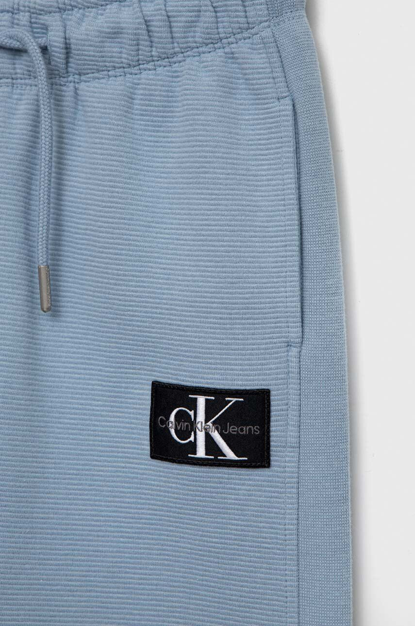 Calvin Klein Jeans Dětské bavlněné tepláky s aplikací - Pepit.cz