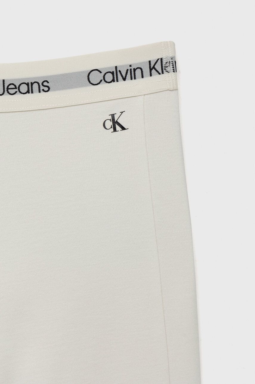 Calvin Klein Jeans Dětské kalhoty bílá barva hladké - Pepit.cz