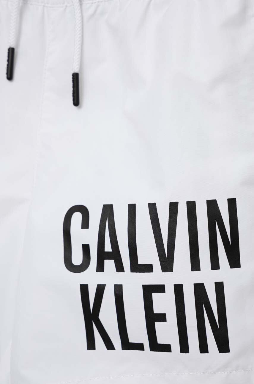 Calvin Klein Jeans Dětské plavkové šortky bílá barva - Pepit.cz