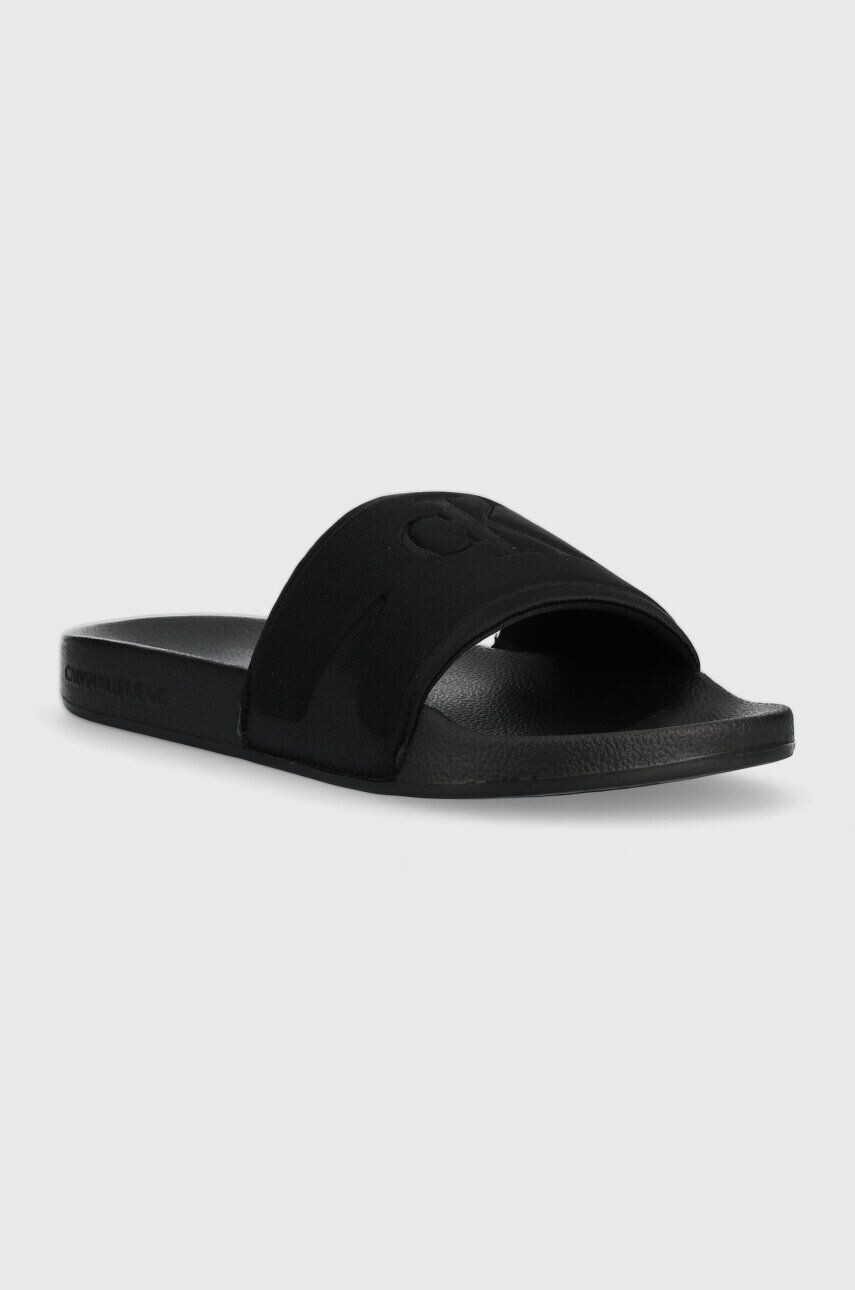 Calvin Klein Jeans Pantofle SLIDE HIGH/LOW FREQUENCY WN dámské černá barva YW0YW00999 - Pepit.cz