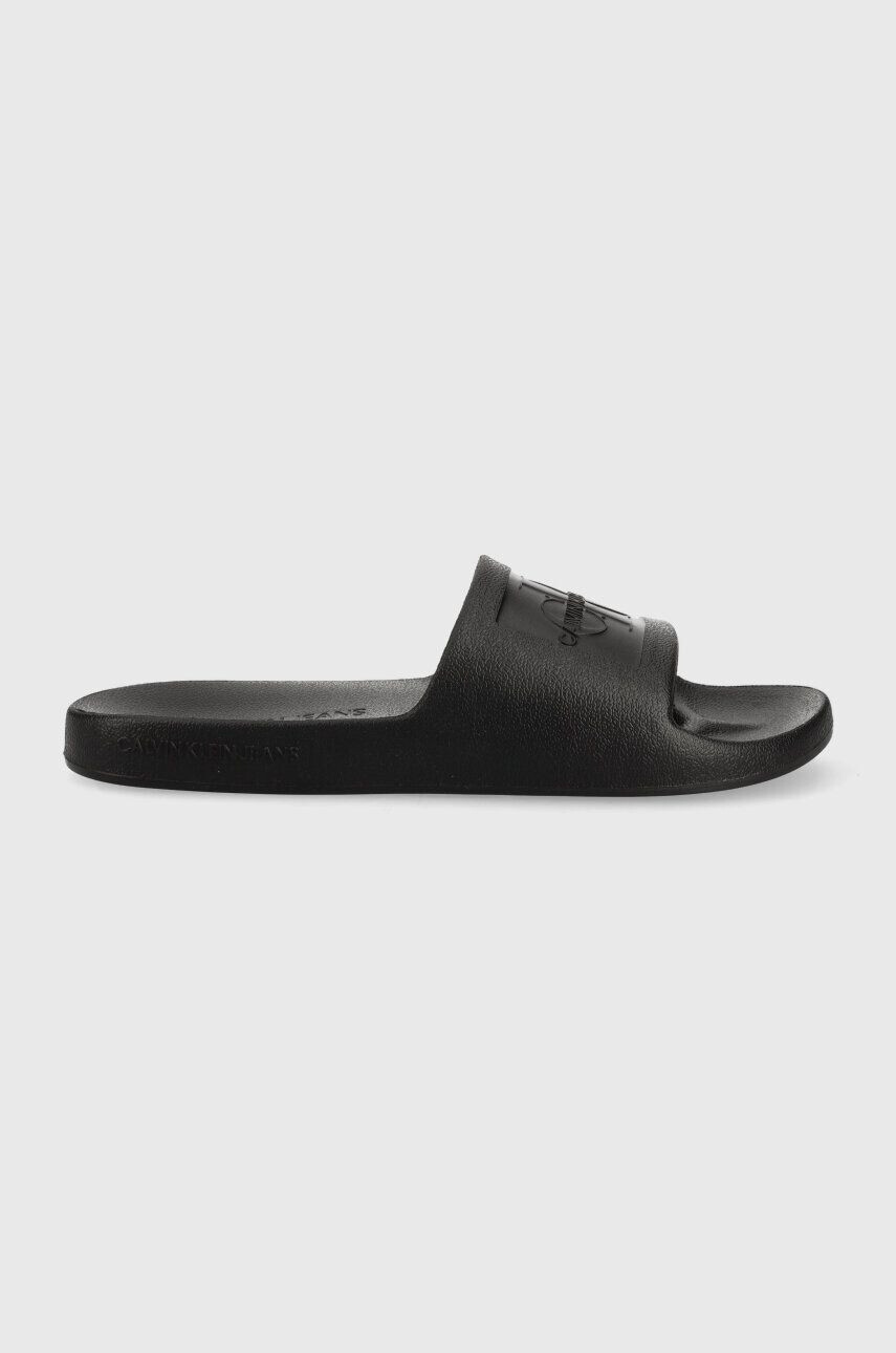 Calvin Klein Jeans Pantofle SLIDE MONOGRAM DEBOSSED EVA dámské černá barva YW0YW00102 - Pepit.cz