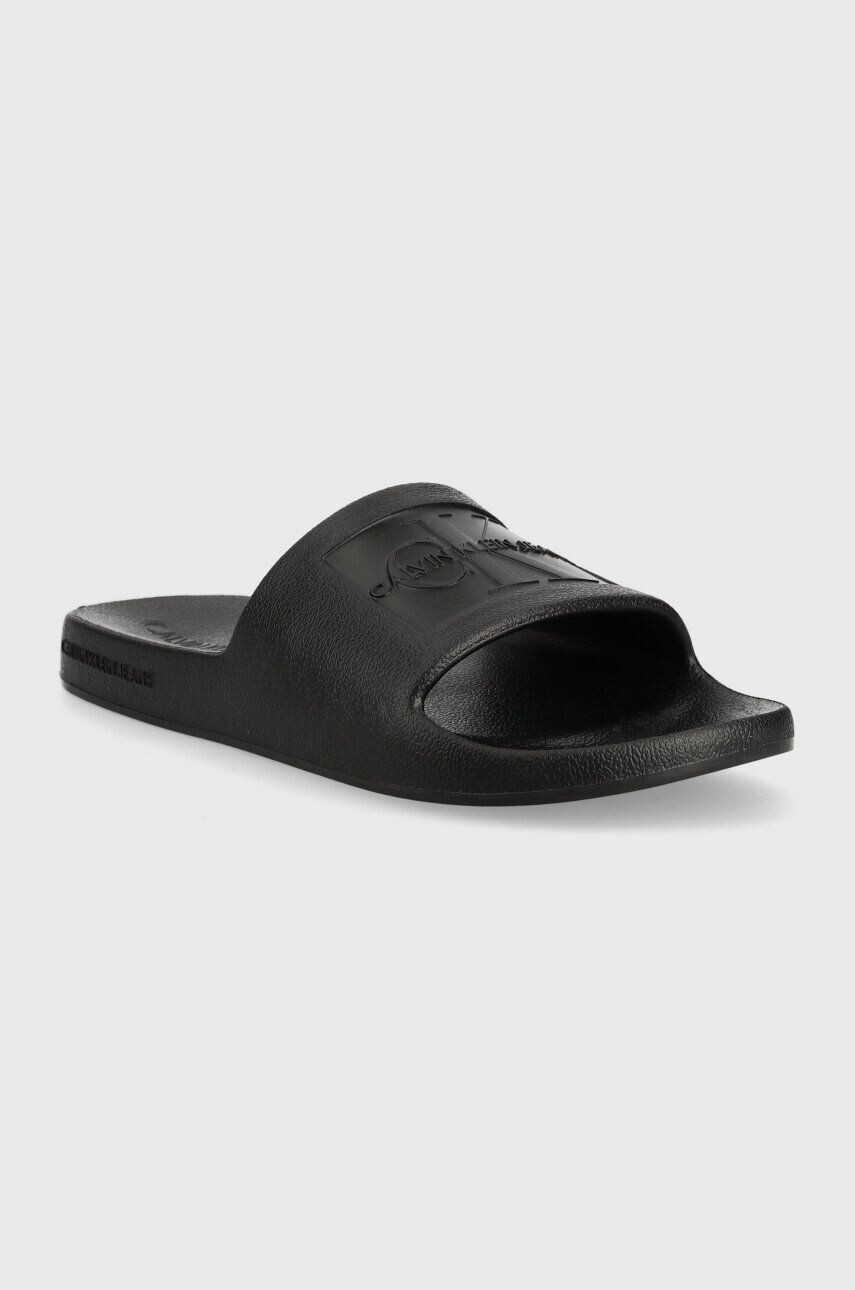 Calvin Klein Jeans Pantofle SLIDE MONOGRAM DEBOSSED EVA dámské černá barva YW0YW00102 - Pepit.cz