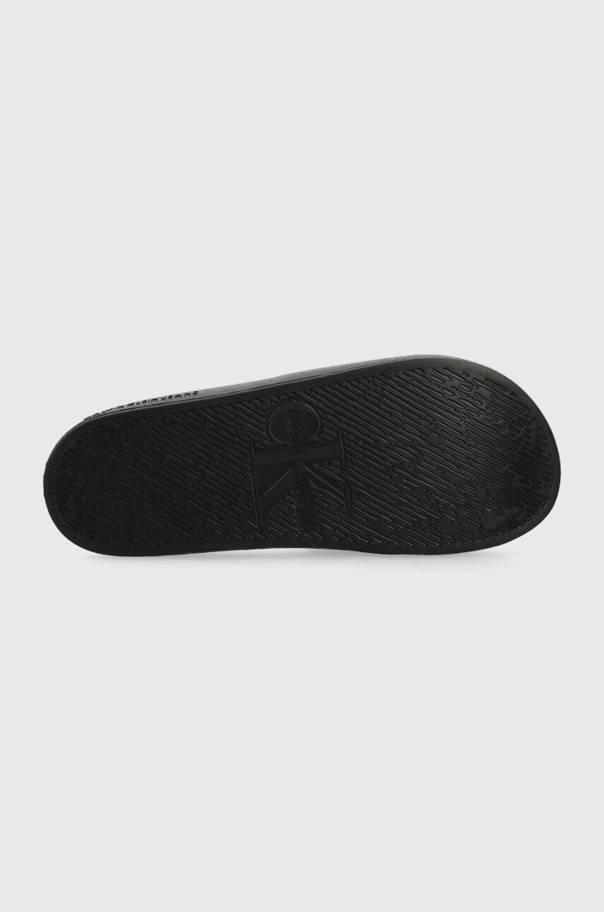 Calvin Klein Jeans Pantofle SLIDE MONOGRAM DEBOSSED EVA dámské černá barva YW0YW00102 - Pepit.cz