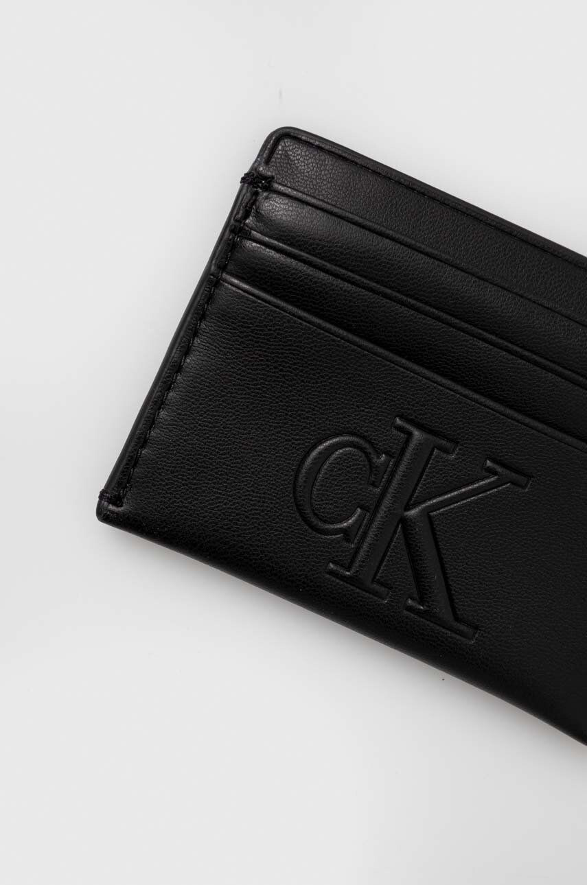 Calvin Klein Jeans Pouzdro na karty černá barva - Pepit.cz