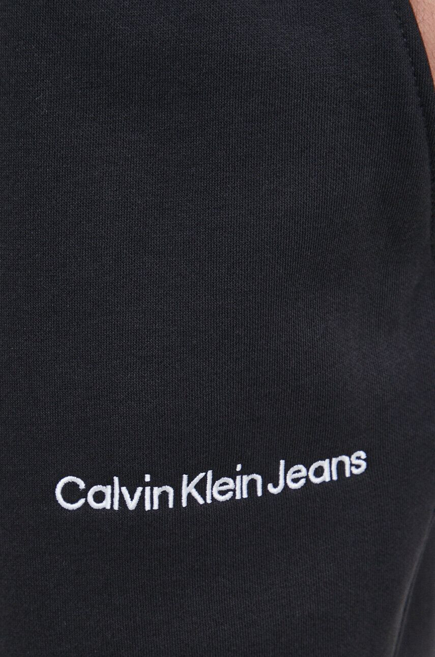 Calvin Klein Jeans Tepláky černá barva s aplikací - Pepit.cz