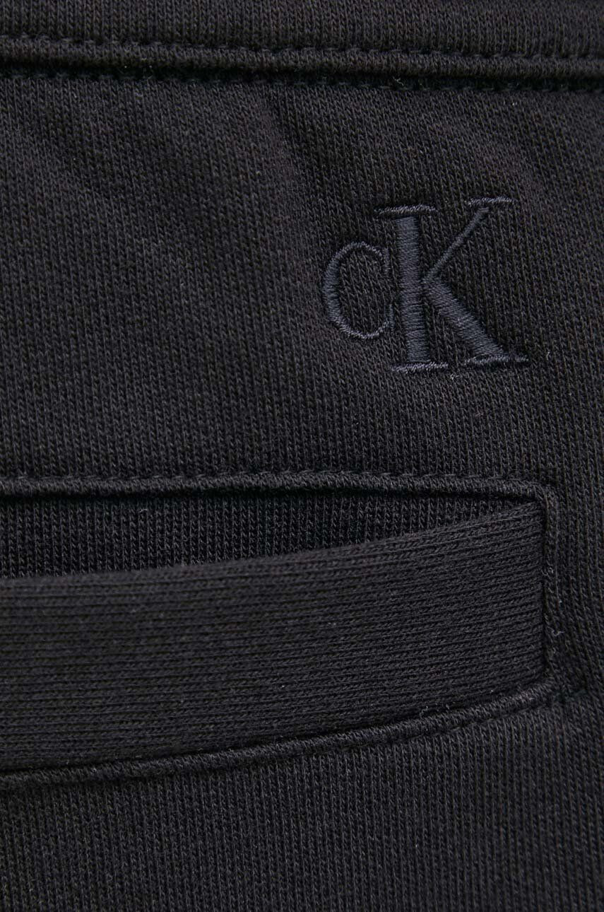 Calvin Klein Jeans Tepláky pánské černá barva hladké - Pepit.cz