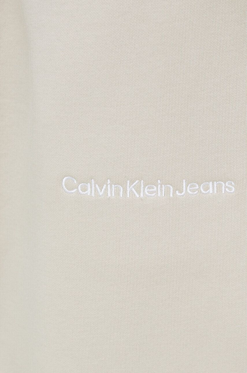 Calvin Klein Jeans Tepláky béžová barva s aplikací - Pepit.cz