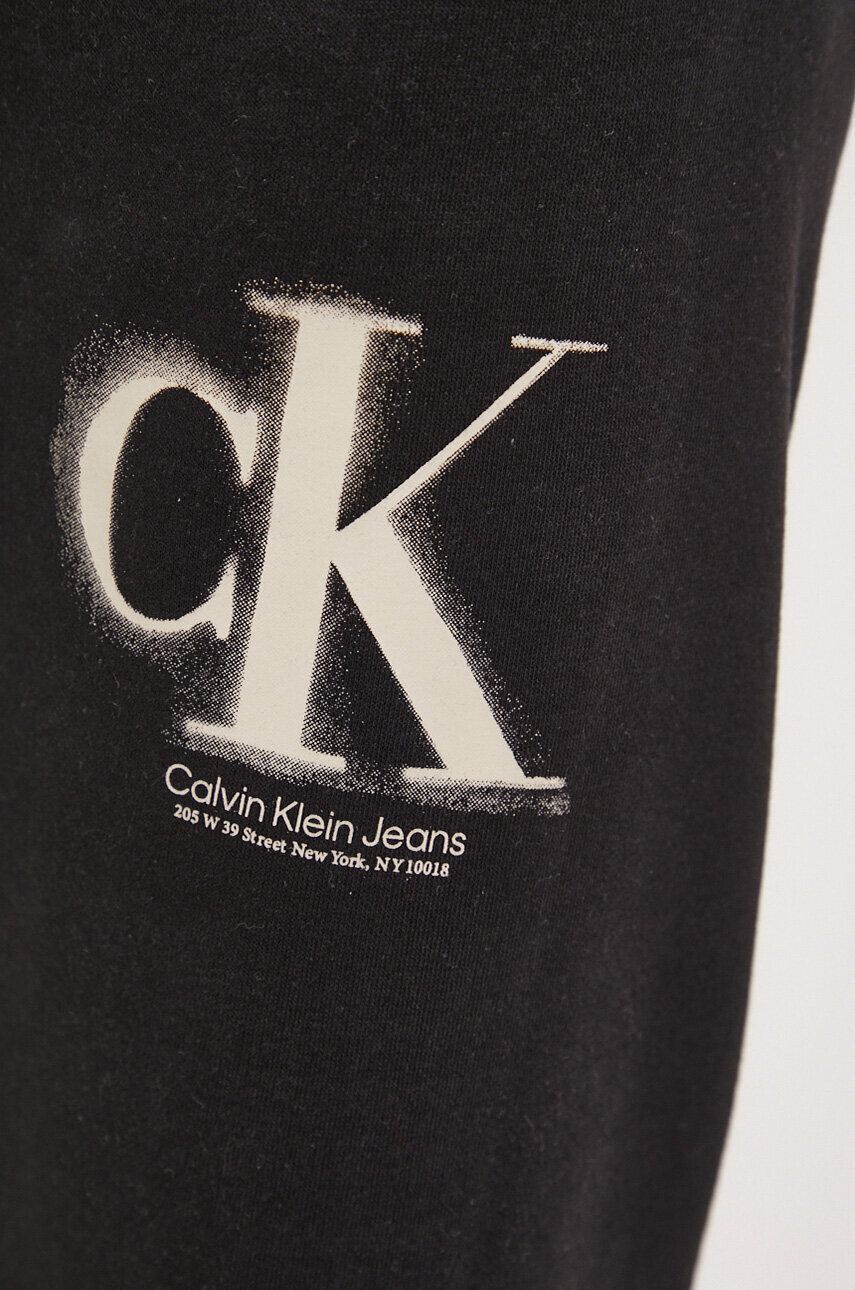 Calvin Klein Jeans Tepláky černá barva vzorované - Pepit.cz