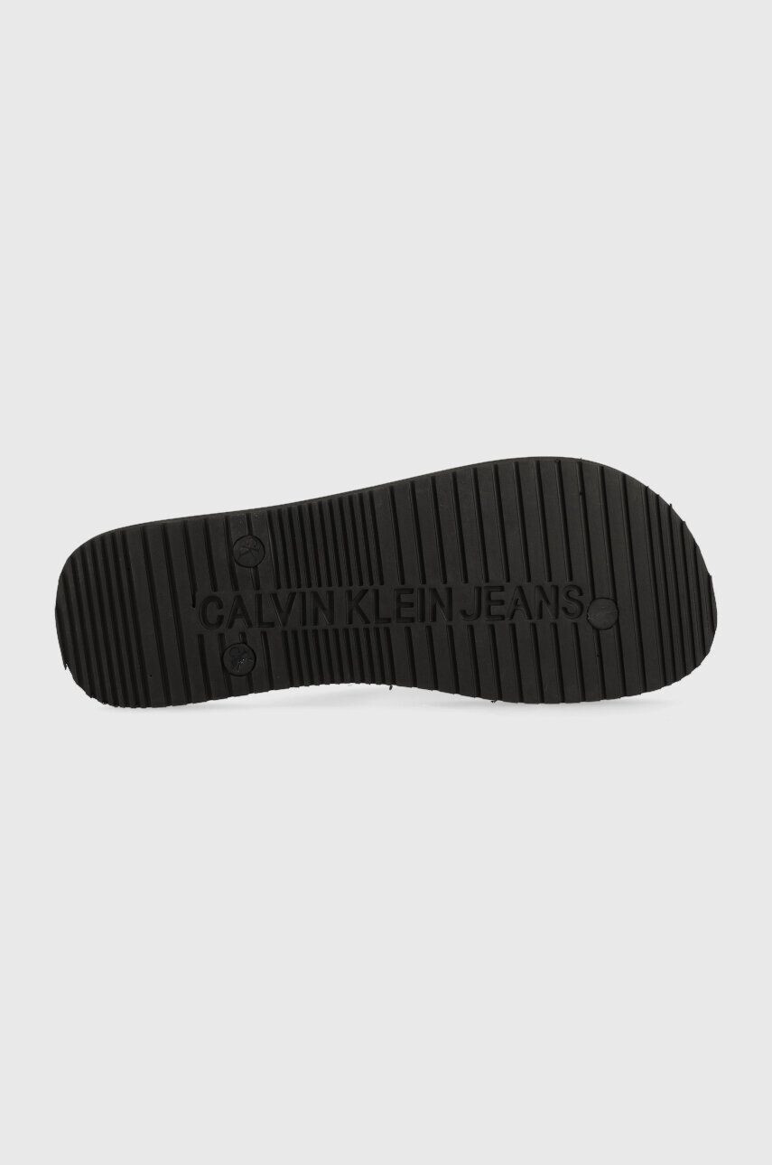 Calvin Klein Jeans Žabky BEACH SANDAL AOP pánské černá barva YM0YM00656 - Pepit.cz