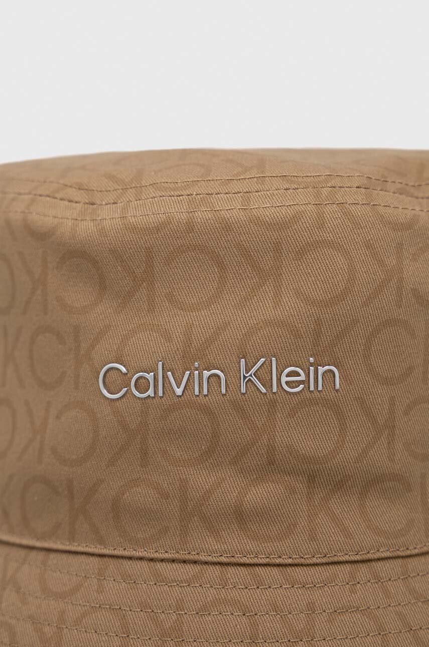 Calvin Klein Oboustranný bavlněný klobouk béžová barva bavlněný - Pepit.cz