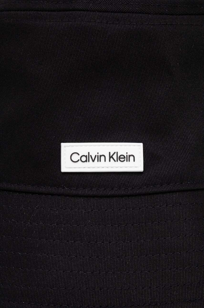 Calvin Klein Oboustranný bavlněný klobouk černá barva bavlněný - Pepit.cz