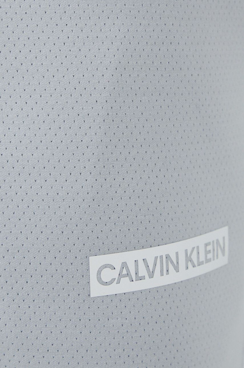 Calvin Klein Performance Kalhoty pánské šedá barva hladké - Pepit.cz