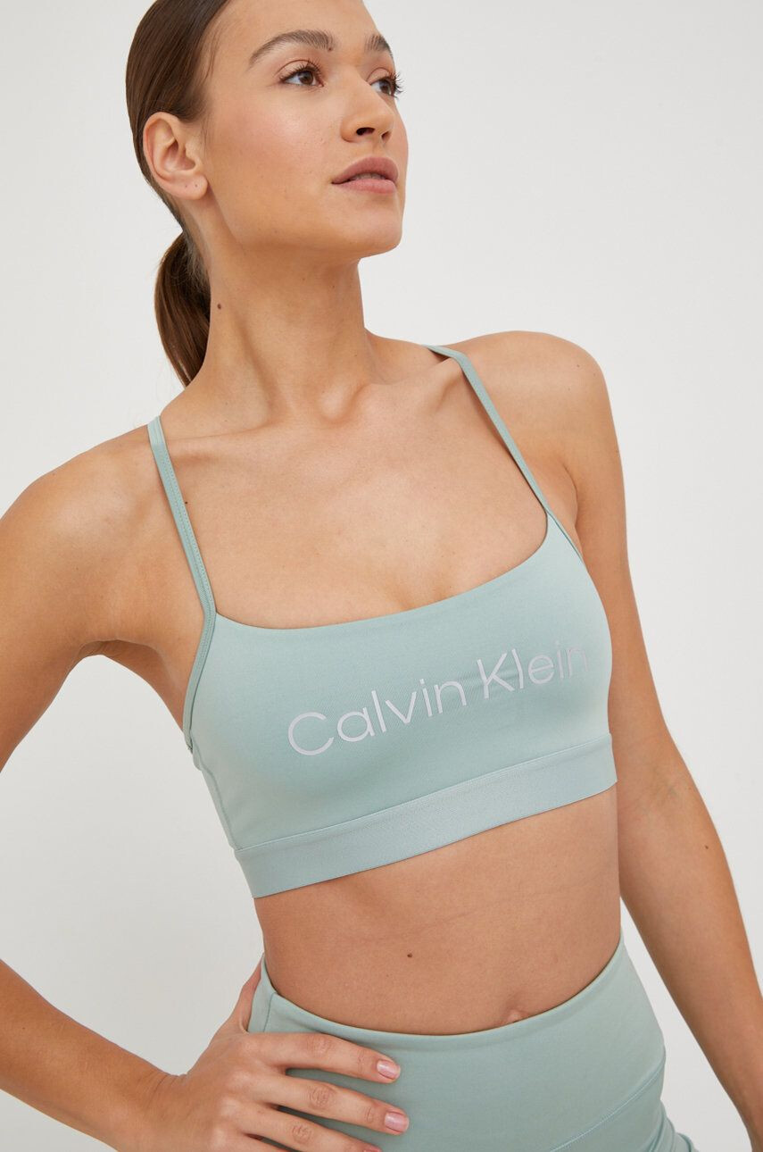 Calvin Klein Performance Sportovní podprsenka Ck Essentials tyrkysová barva - Pepit.cz