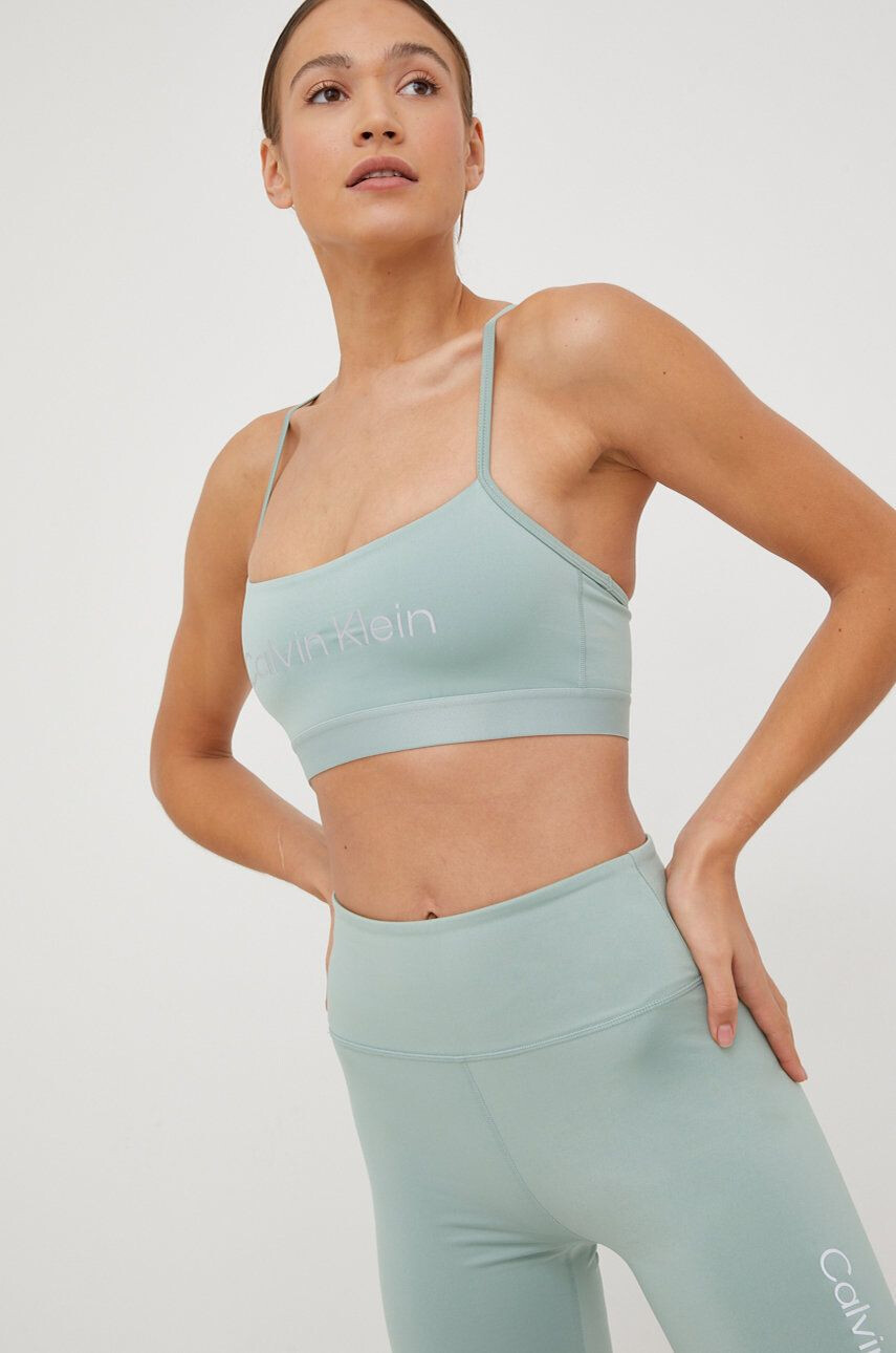 Calvin Klein Performance Sportovní podprsenka Ck Essentials tyrkysová barva - Pepit.cz