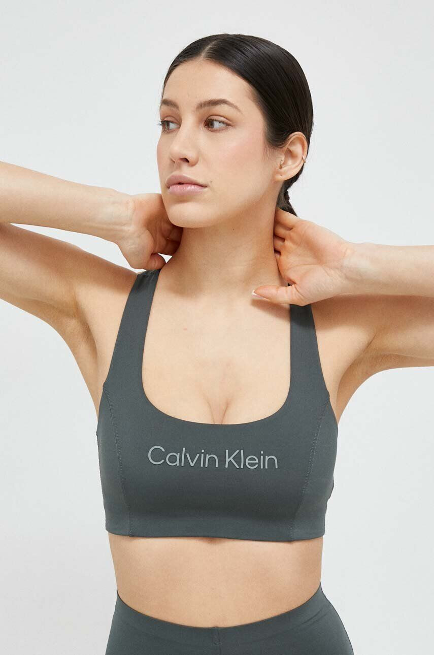 Calvin Klein Performance Sportovní podprsenka Essentials zelená barva - Pepit.cz