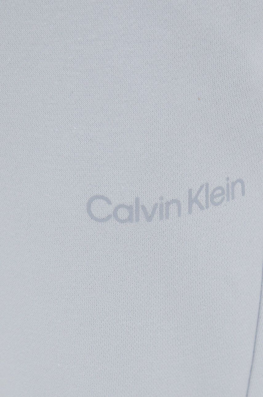 Calvin Klein Performance Tepláky Ck Essentials dámské šedá barva hladké - Pepit.cz