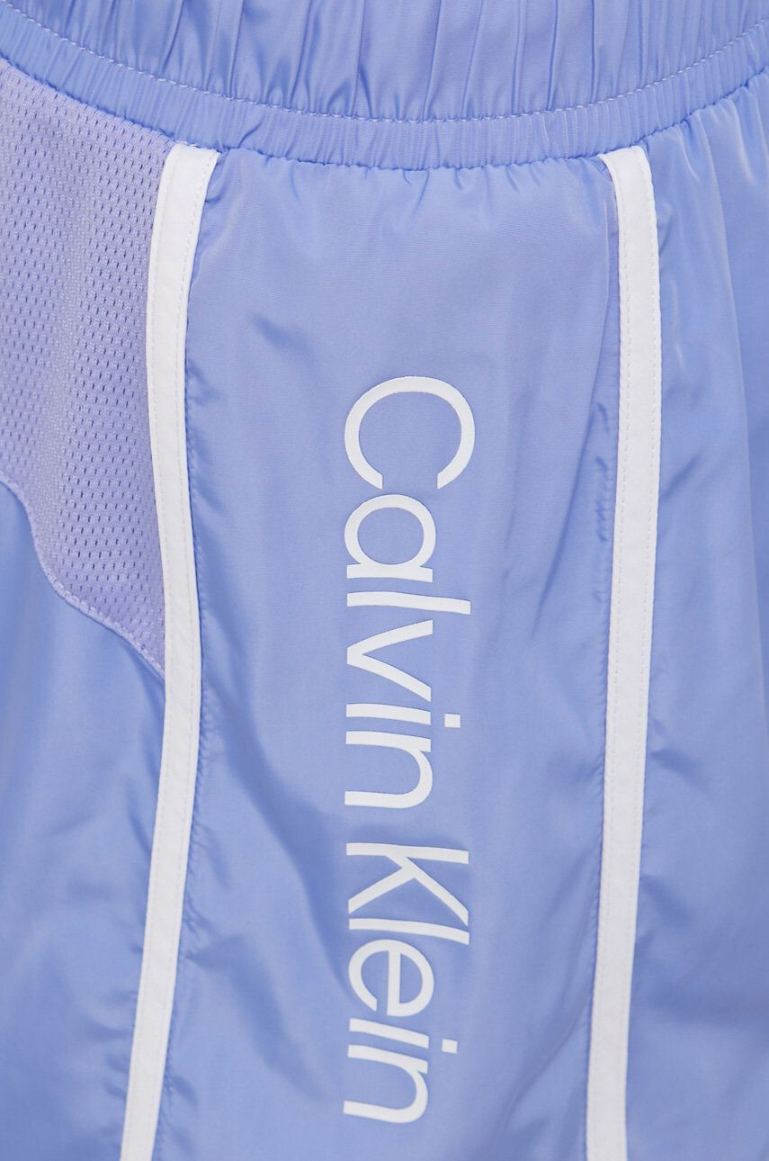 Calvin Klein Performance Tréninkové šortky Ck Essentials dámské fialová barva s potiskem high waist - Pepit.cz