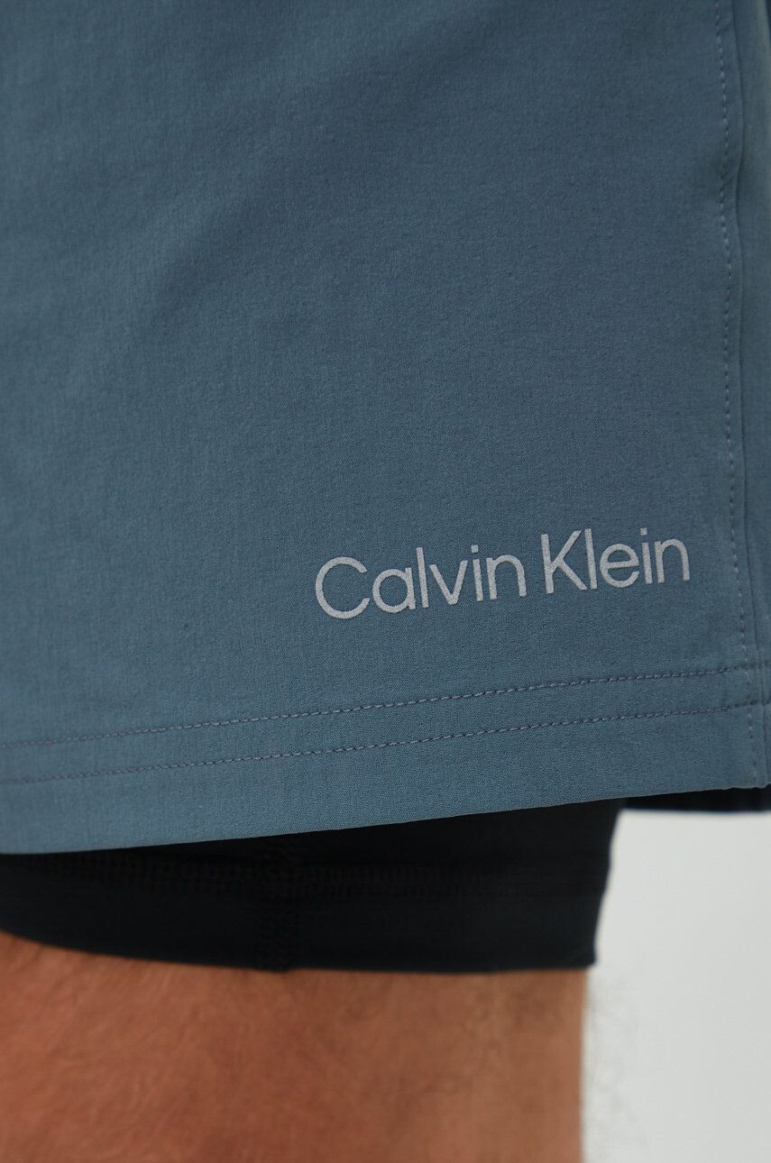 Calvin Klein Performance Tréninkové šortky Ck Essentials pánské zelená barva - Pepit.cz