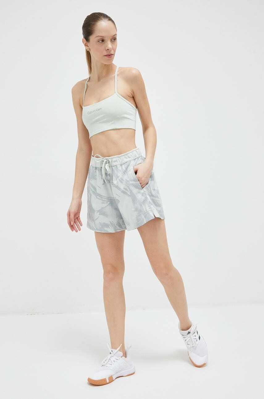 Calvin Klein Performance Tréninkové šortky Essentials zelená barva vzorované high waist - Pepit.cz