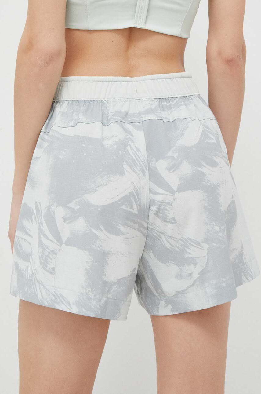 Calvin Klein Performance Tréninkové šortky Essentials zelená barva vzorované high waist - Pepit.cz