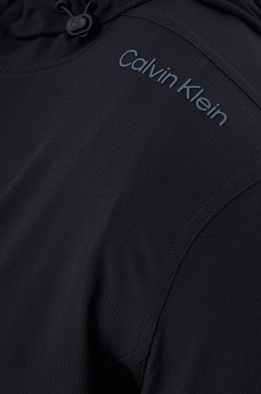 Calvin Klein Performance Větrovka Essentials černá barva přechodná - Pepit.cz