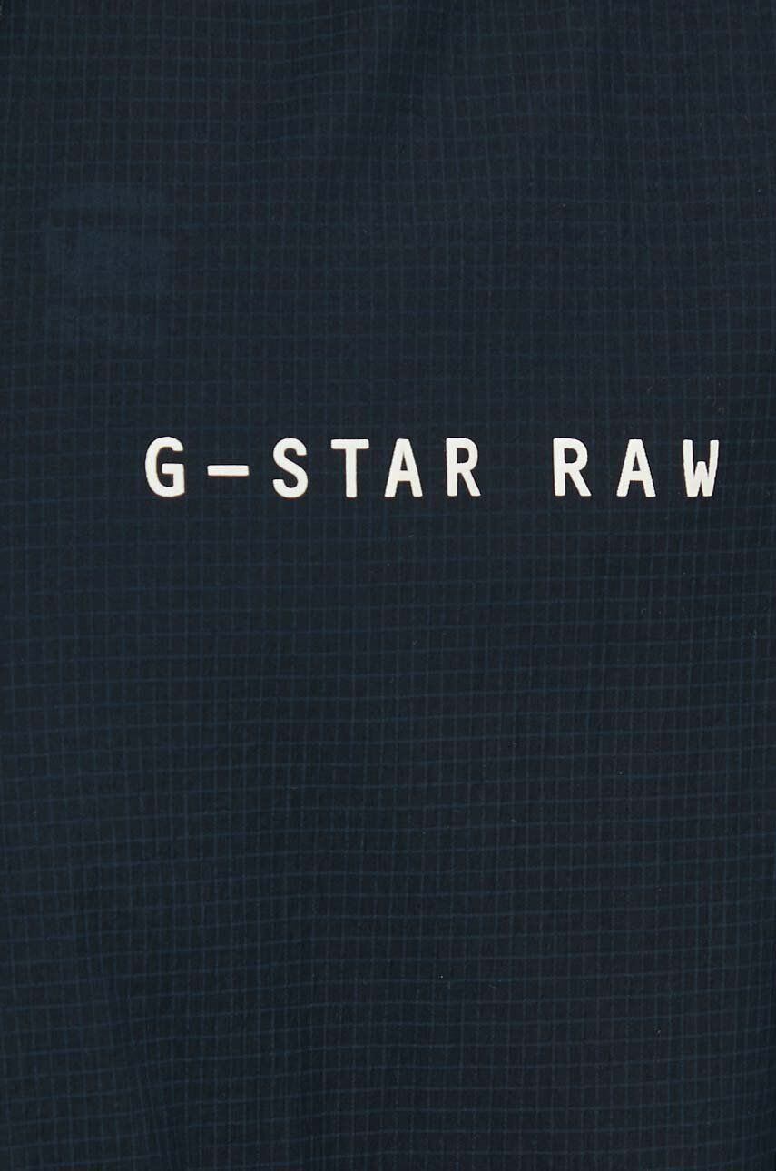 G-Star Raw Bunda pánská tmavomodrá barva přechodná oversize - Pepit.cz