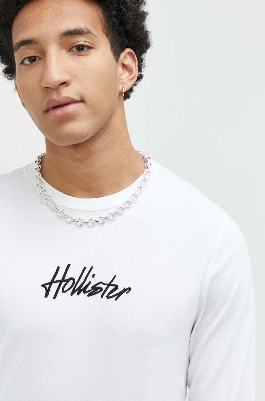 Hollister Co. Bavlněné tričko s dlouhým rukávem bílá barva s aplikací - Pepit.cz