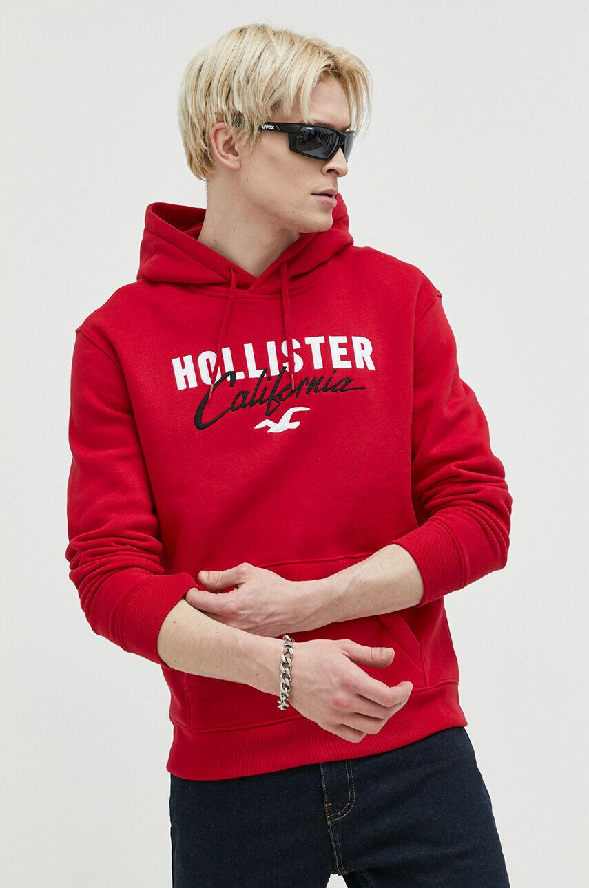 Hollister Co. Mikina pánská červená barva s kapucí s aplikací - Pepit.cz