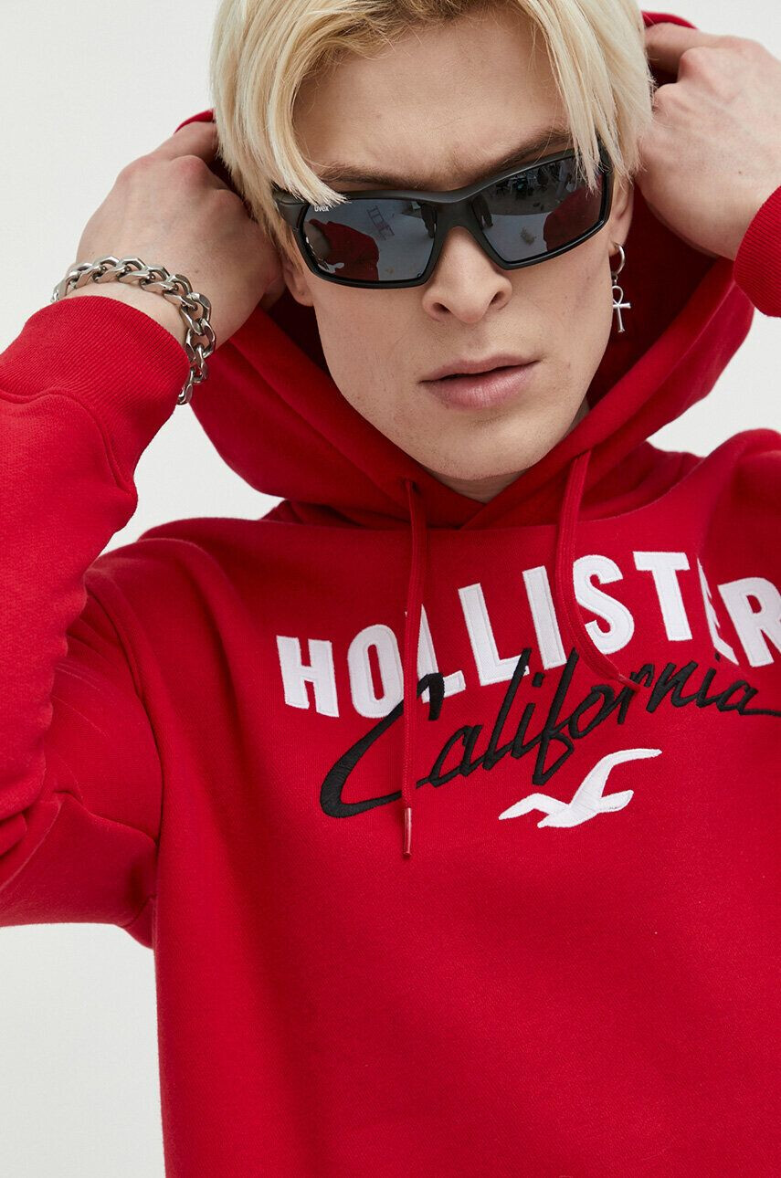 Hollister Co. Mikina pánská červená barva s kapucí s aplikací - Pepit.cz