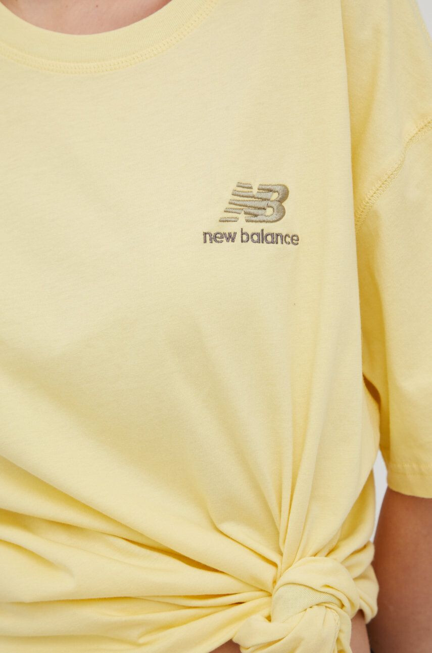 New Balance Bavlněné tričko žlutá barva - Pepit.cz