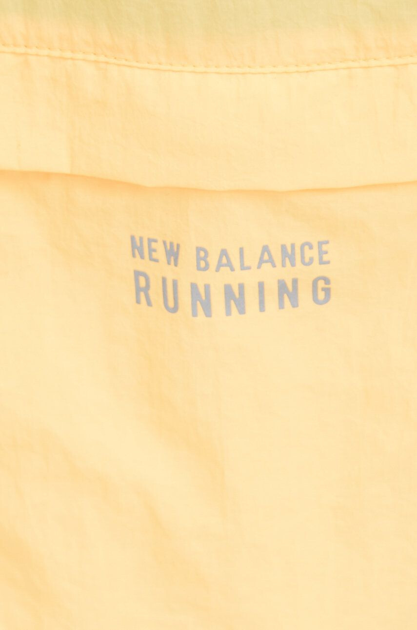 New Balance Běžecká bunda Impact Run oranžová barva oversize - Pepit.cz