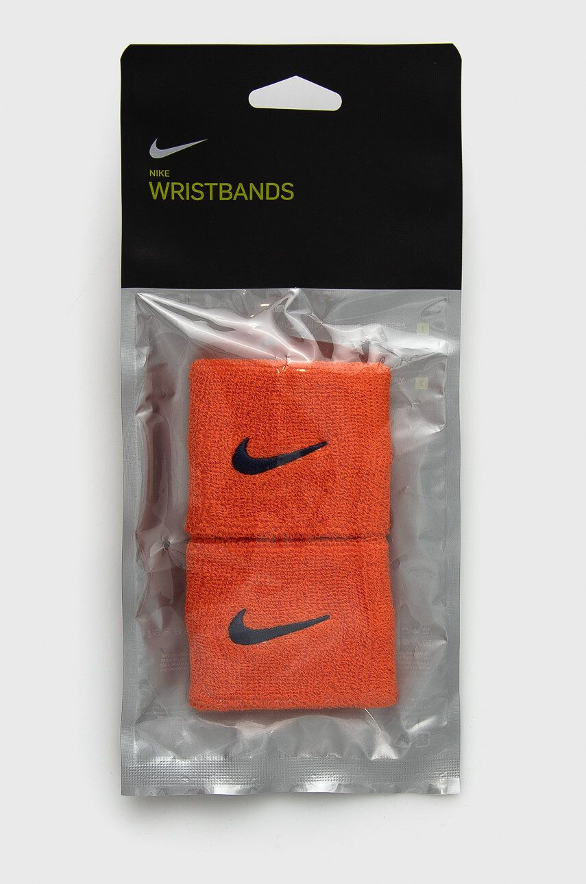 Nike Pásek na zápěstí oranžová barva - Pepit.cz