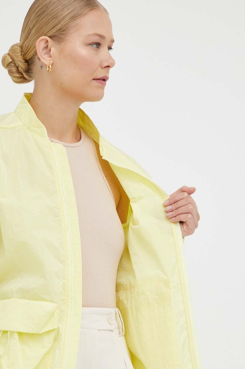 Rains Nepromokavá bunda 18960 Bomber Jacket žlutá barva přechodná - Pepit.cz